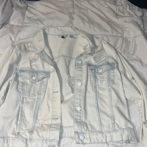 Distressed light washed denim jacket